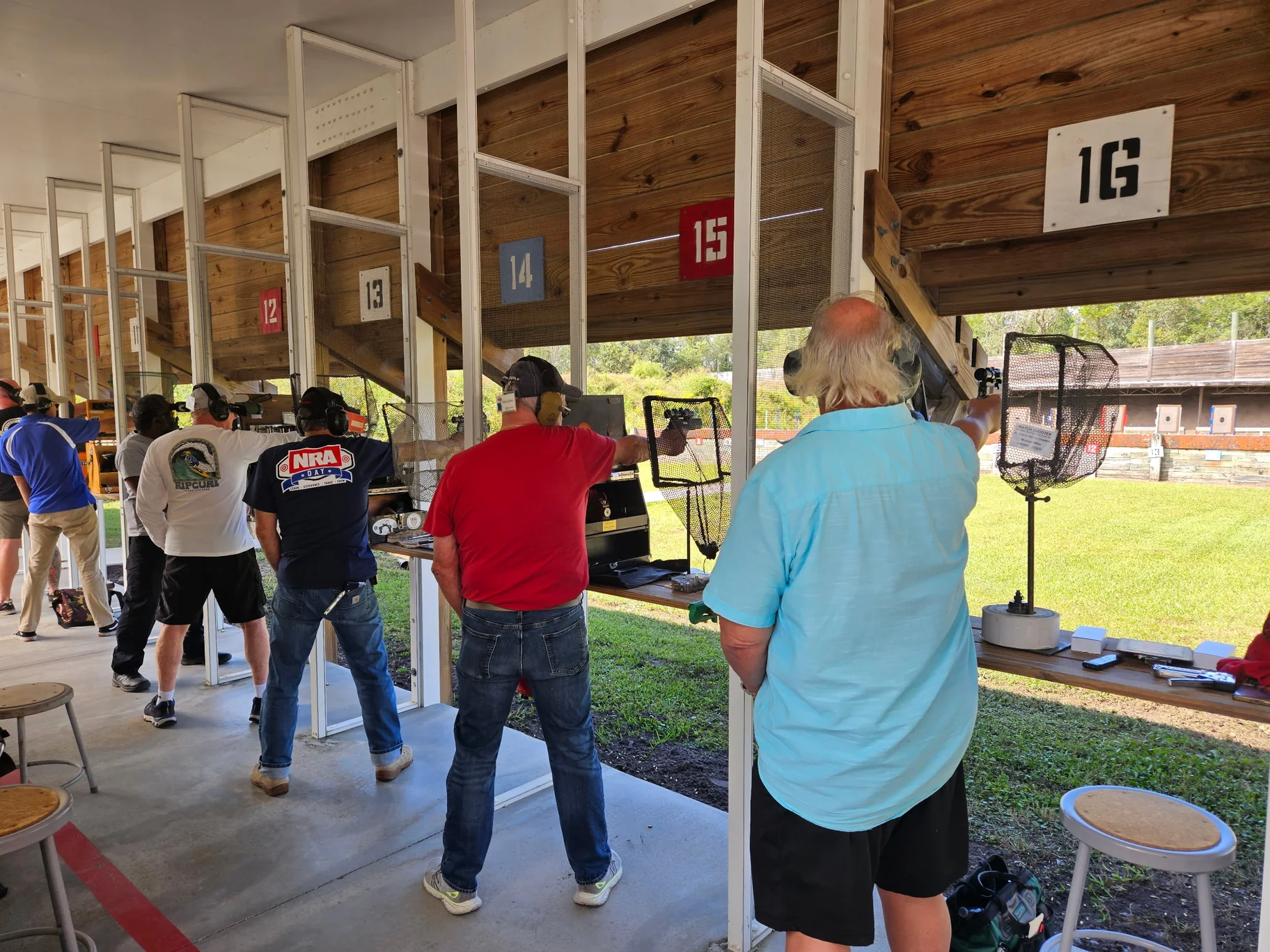 Precision Pistol competitors on the firing line at Gateway Rifle & Pistol Club in Jacksonville, Florida.